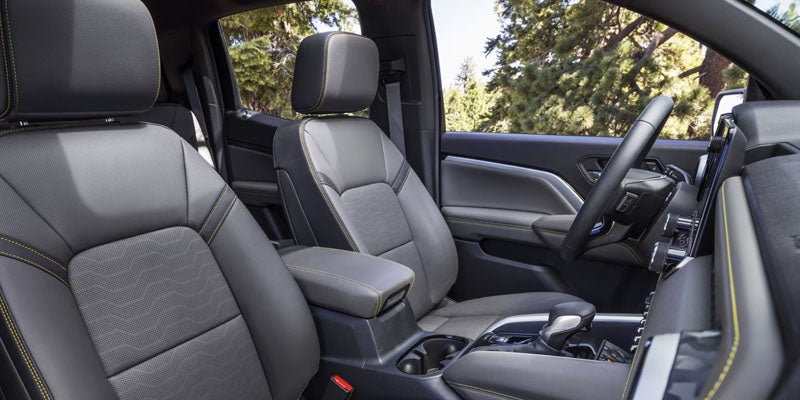 Black leather front seats inside a Chevy Colorado interior.